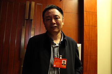 张尧学委员：取消统一的选拔性考试